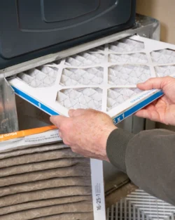 HVAC Contractor in Riverside replacing HVAC air filter for better indoor air quality